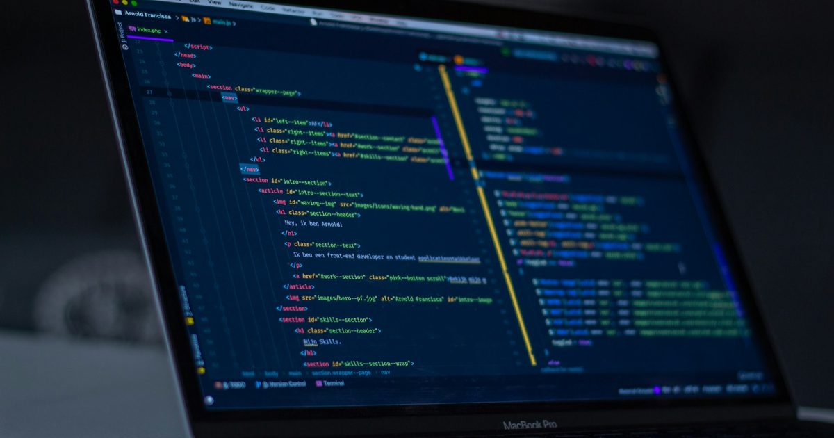 A monitor showing the source code of an application already in production